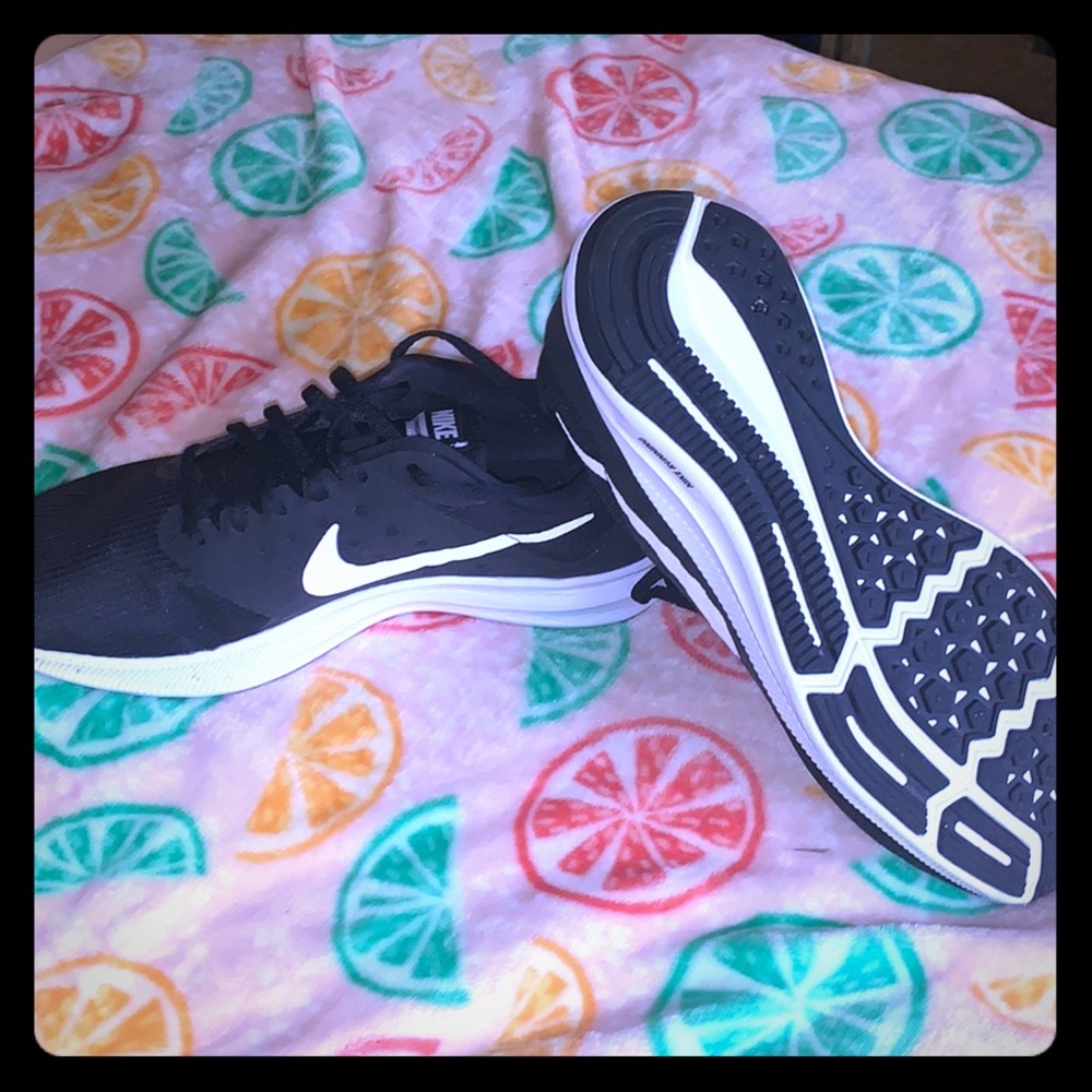 Nike “Downshifter 7” Size 10 Woman running shoes.